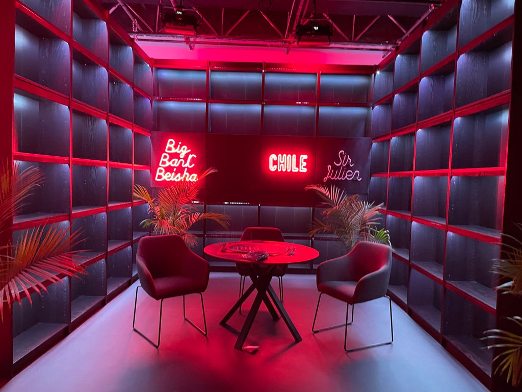 Completed Luc Belaire hospitality lounge with custom red neon signage